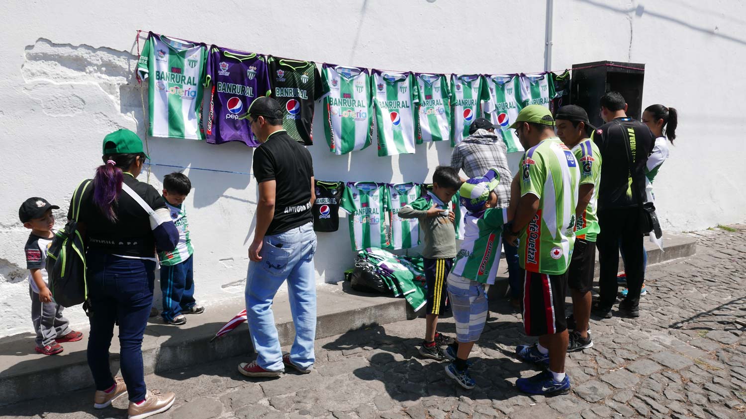 Selling shirts of the local club in Antigua Guatemala