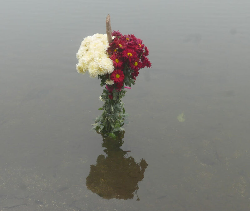 Flower sacrifice in Lake Chicabal