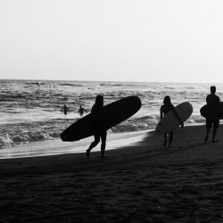 Surfers at El Sunzal beach, El Tunco village, El Salvador