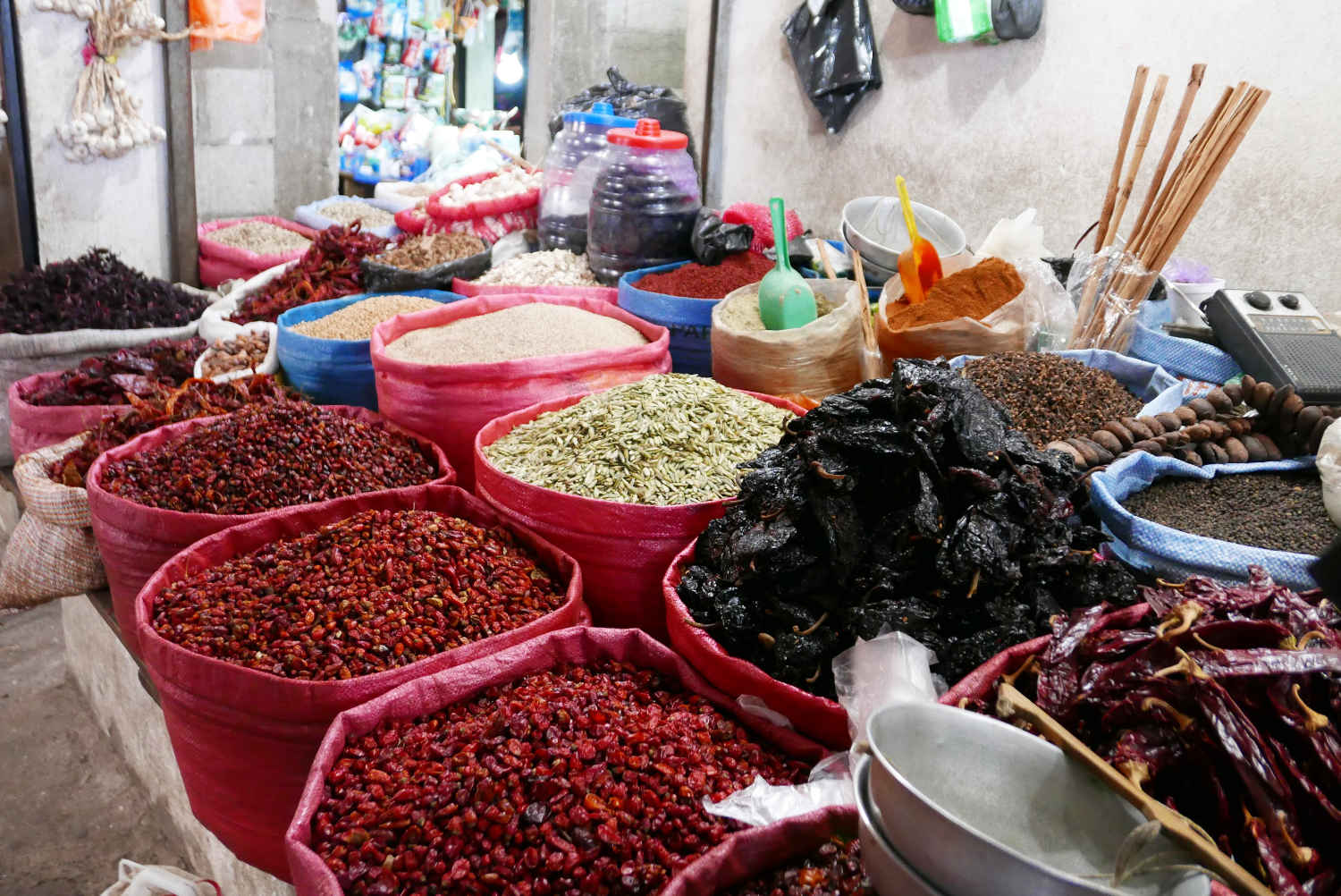 Spices and ingredients (coffee in red!) in Minerva market in Xela