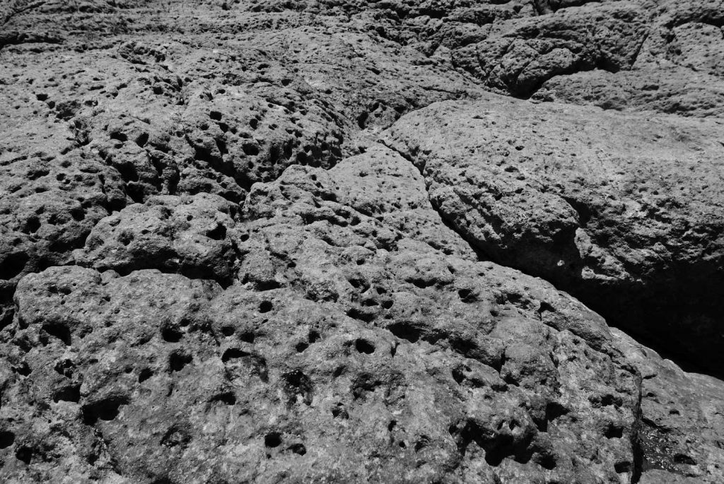 Rocks on Las Penitas beach, near Leon in Nicaragua