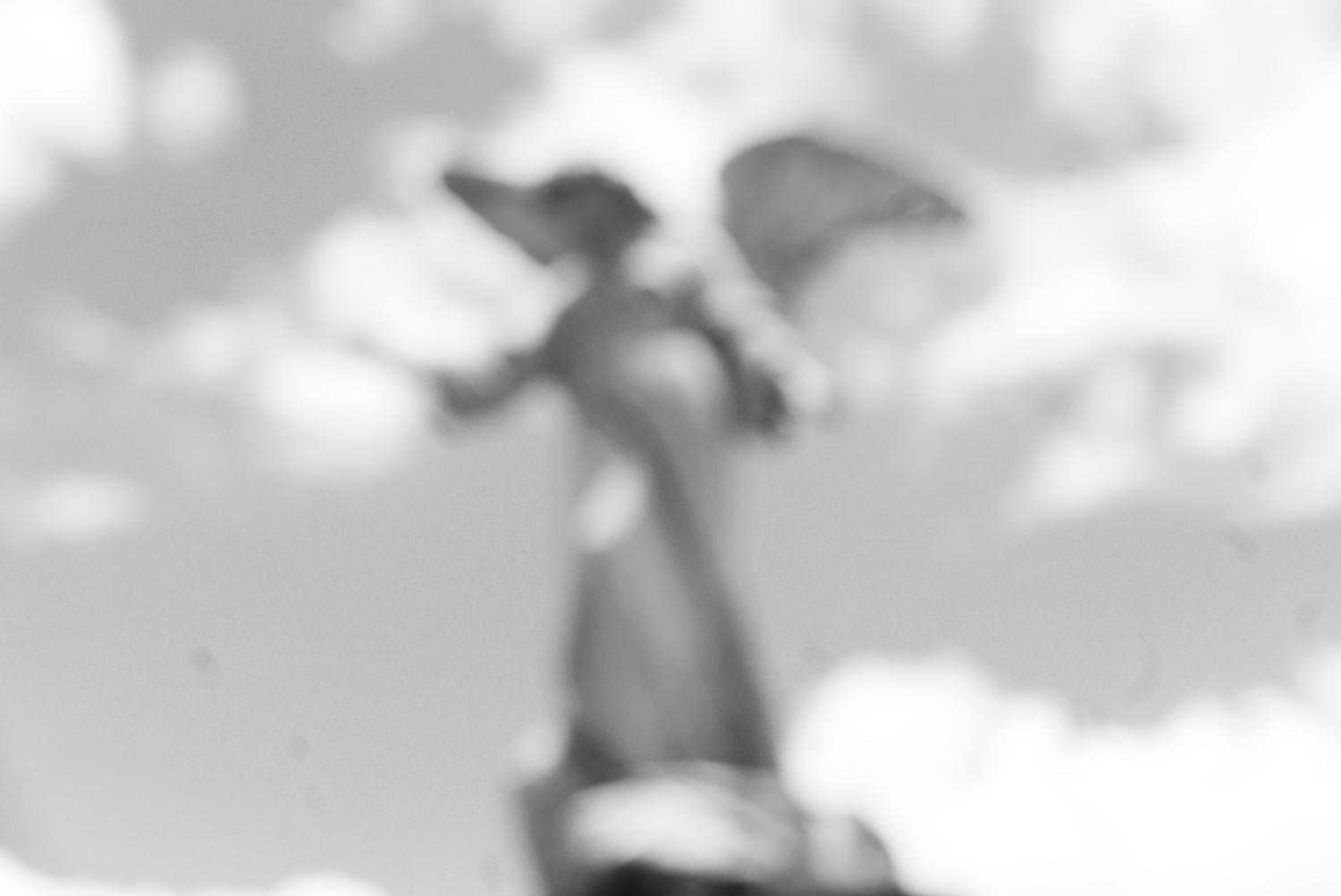 Blurry angel in Cemetery in San Jose, Costa Rica