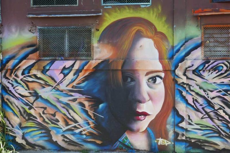 Shrewd woman. Street art in San Jose, Costa Rica