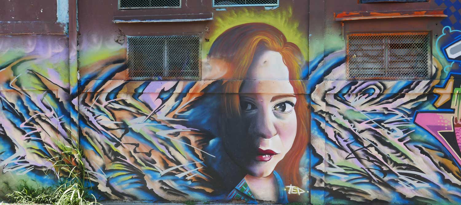 Shrewd woman. Street art in San Jose, Costa Rica