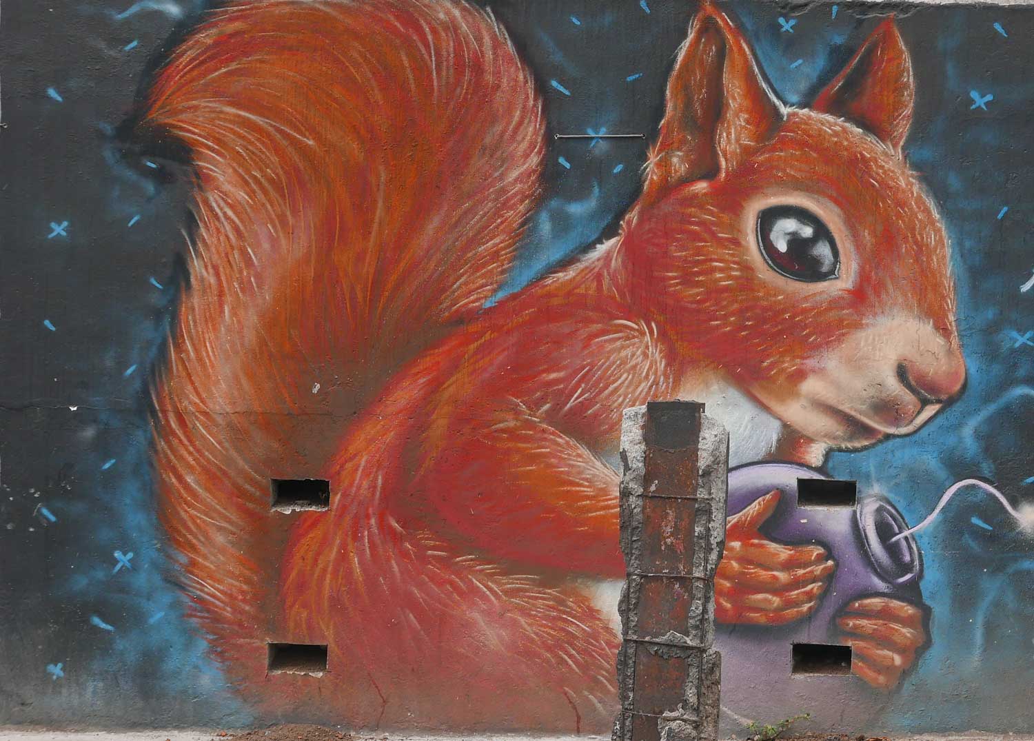 Spraying squirrel. Street art in San Jose, Costa Rica