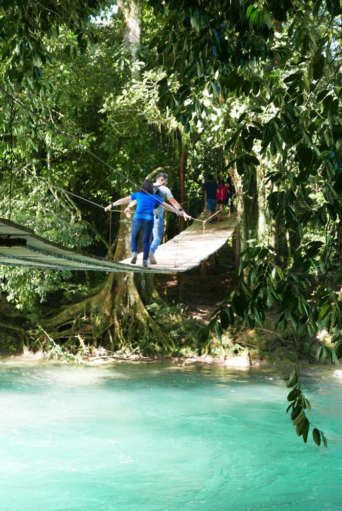 Rope bridge over the Agua Azul waterfalls in Mexico