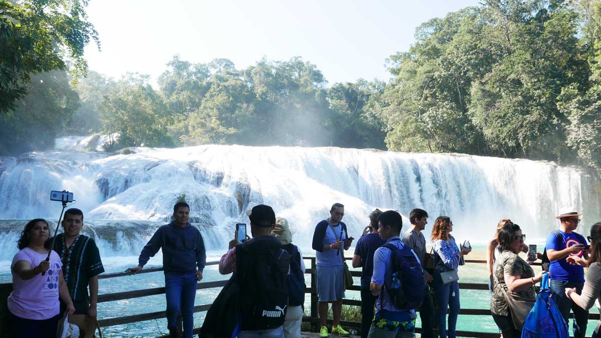 Tourists at Agua Azul waterfalls in Mexico