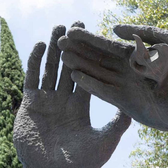 Reaching Hands artwork Puebla